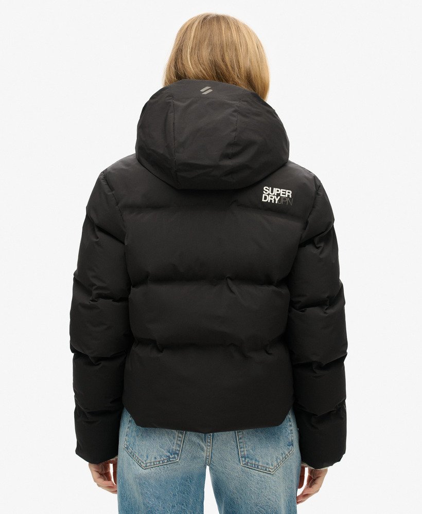 jaqueta puffer boxy com capuz na cor preta.