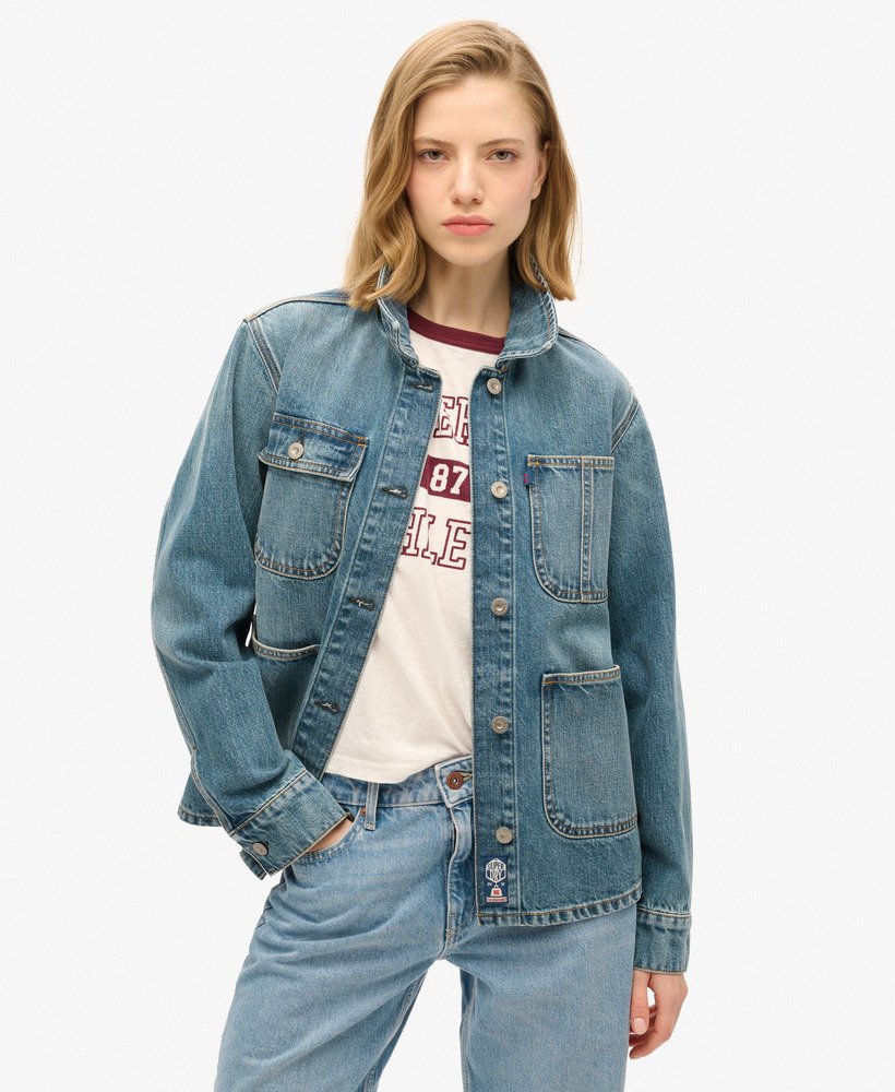 jaqueta utilitária em denim bordado na cor azul vintage fulton