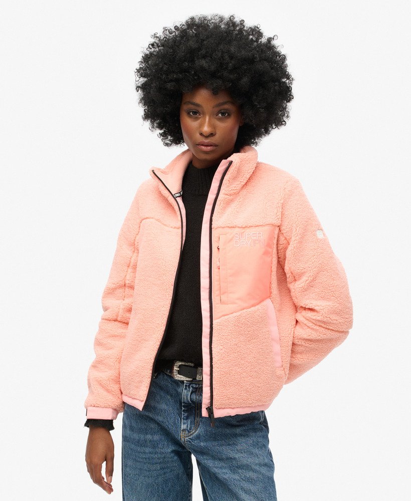 jaqueta trekker de lã polar na cor rosa pêssego pérola
