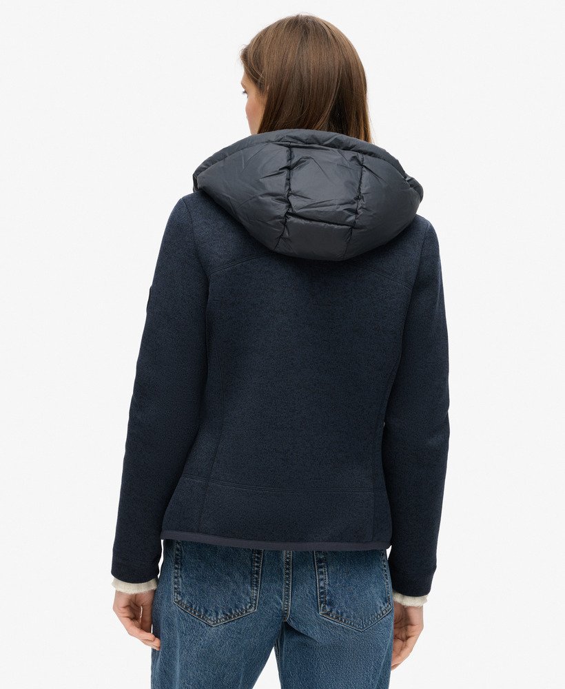 jaqueta híbrida storm knit com capuz na cor azul marinho eclipse