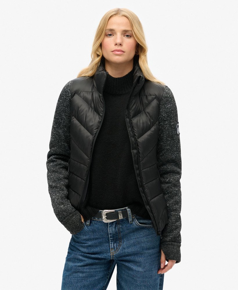 jaqueta híbrida storm knit na cor preta.