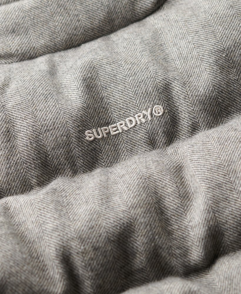 jaqueta puffer boxy de tweed na cor cinza mesclado.