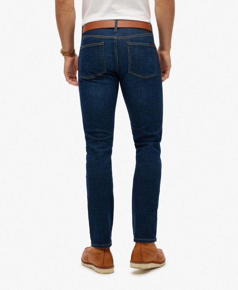 calça jeans vintage slim reta na cor rutgers dark ink
