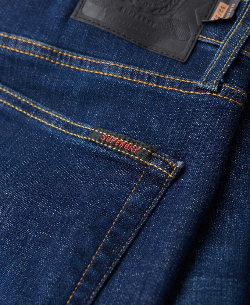 calça jeans vintage slim reta na cor rutgers dark ink