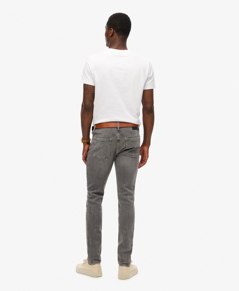 calça jeans skinny vintage na cor cinza usado clinton