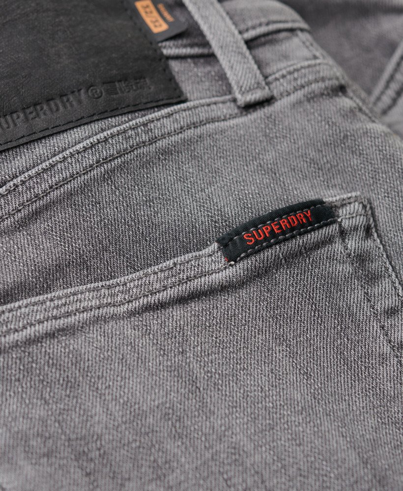 calça jeans skinny vintage na cor cinza usado clinton