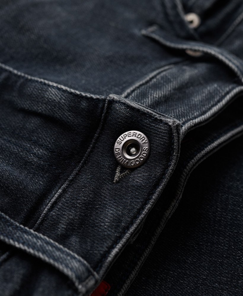 calça jeans skinny vintage na cor vanderbilt ink com efeito desgastado.