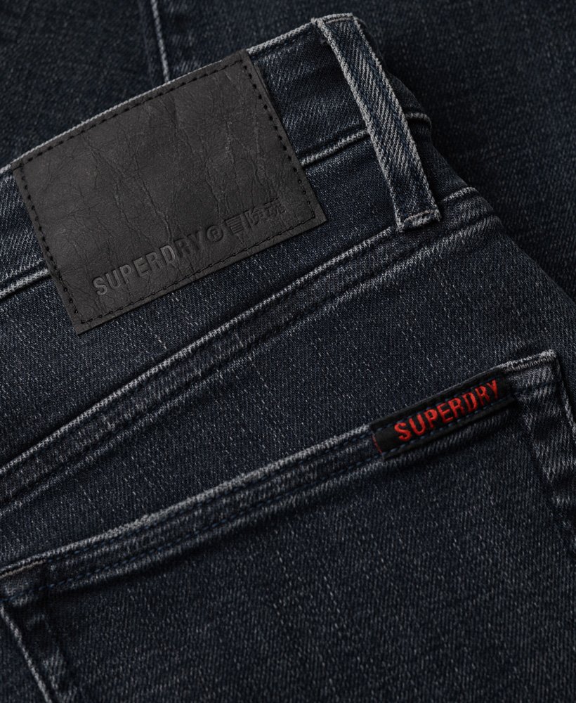 calça jeans skinny vintage na cor vanderbilt ink com efeito desgastado.