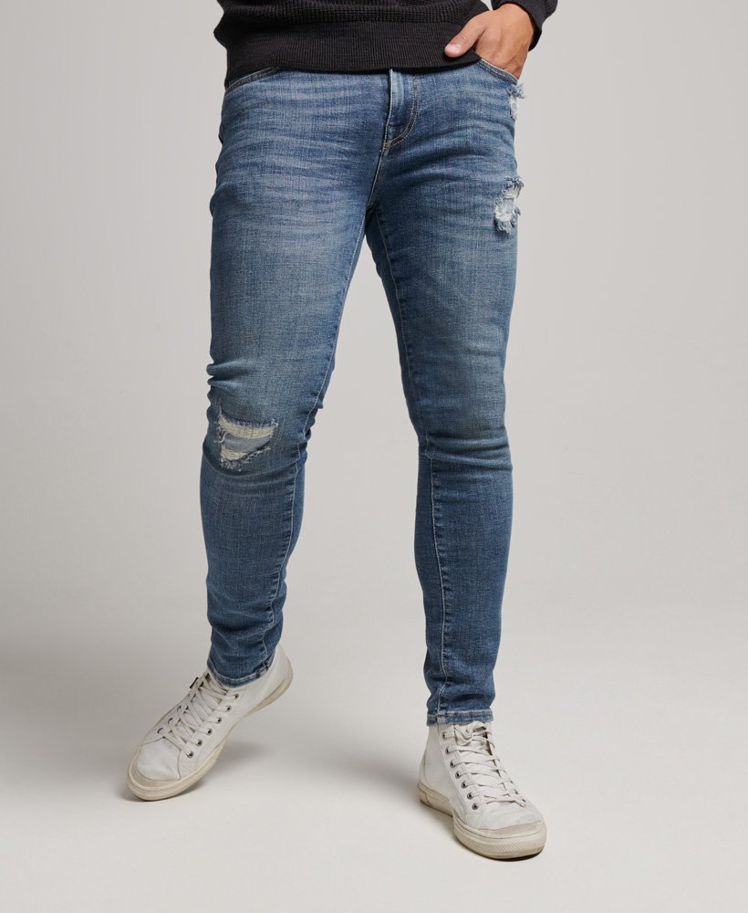 calça jeans skinny vintage stanton azul brilhante rasgada
