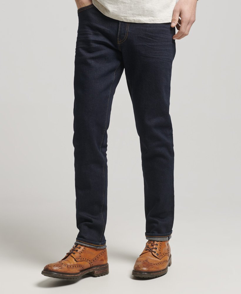 the merchant store - calça jeans slim orgânica em sarja azul escura