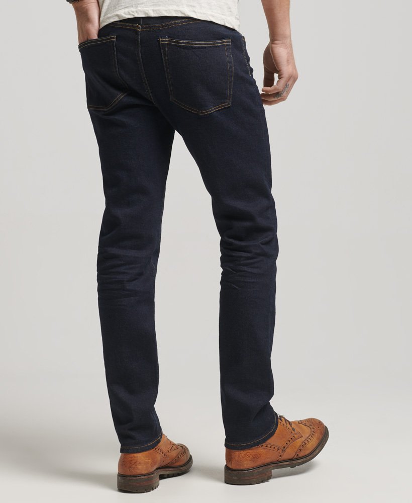 the merchant store - calça jeans slim orgânica em sarja azul escura