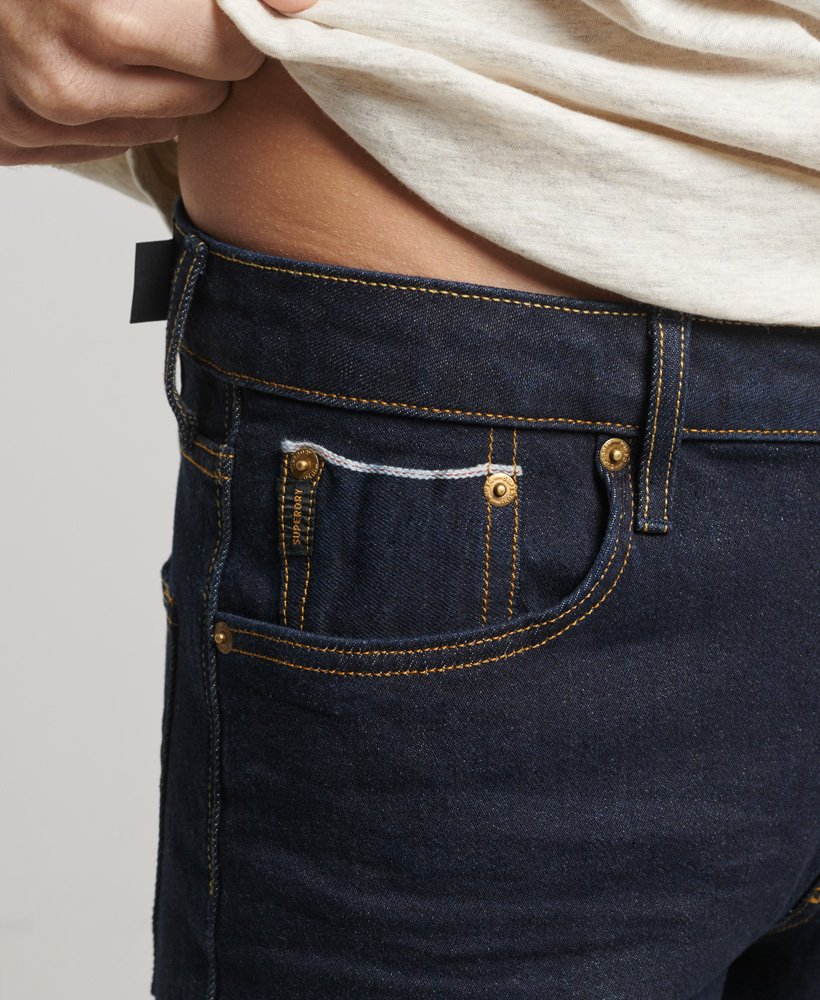 the merchant store - calça jeans slim orgânica em sarja azul escura