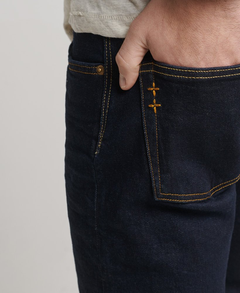 the merchant store - calça jeans slim orgânica em sarja azul escura