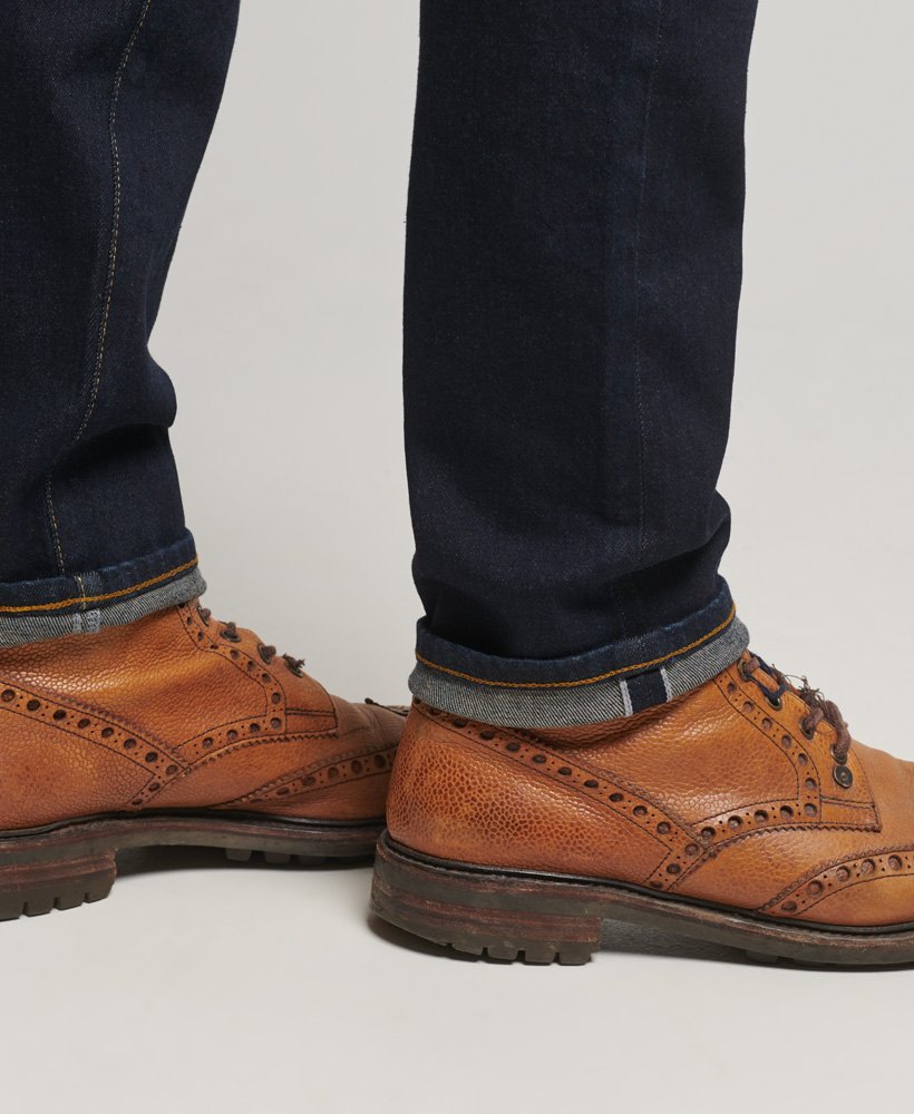 the merchant store - calça jeans slim orgânica em sarja azul escura