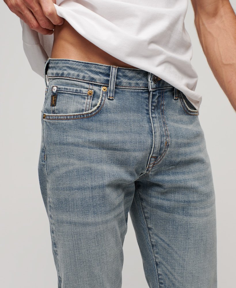 calça jeans vintage slim na cor azul claro fulton