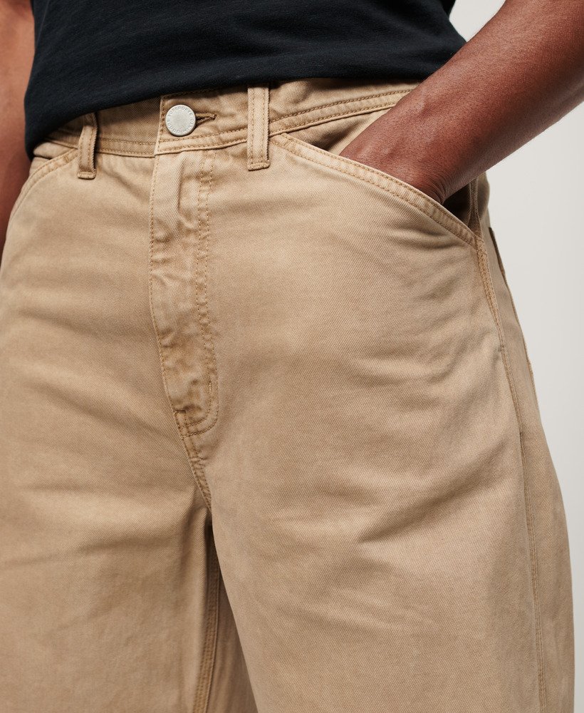 calça de trabalho com cinco bolsos na cor marrom areia do cânion