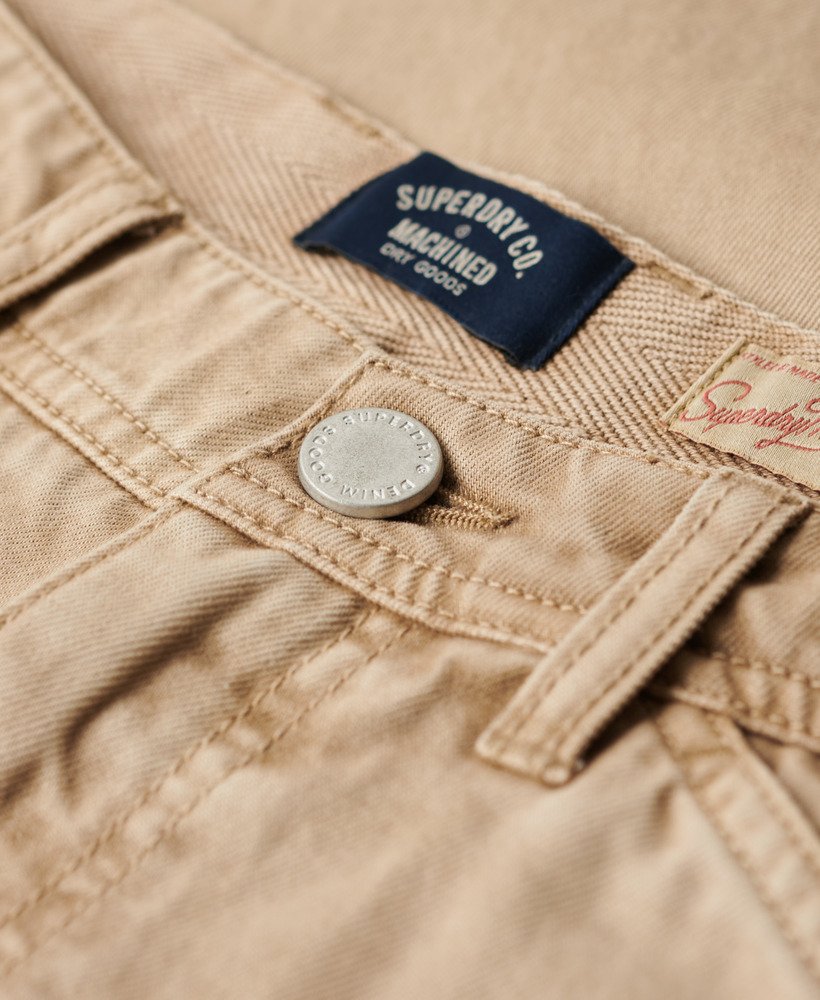 calça de trabalho com cinco bolsos na cor marrom areia do cânion