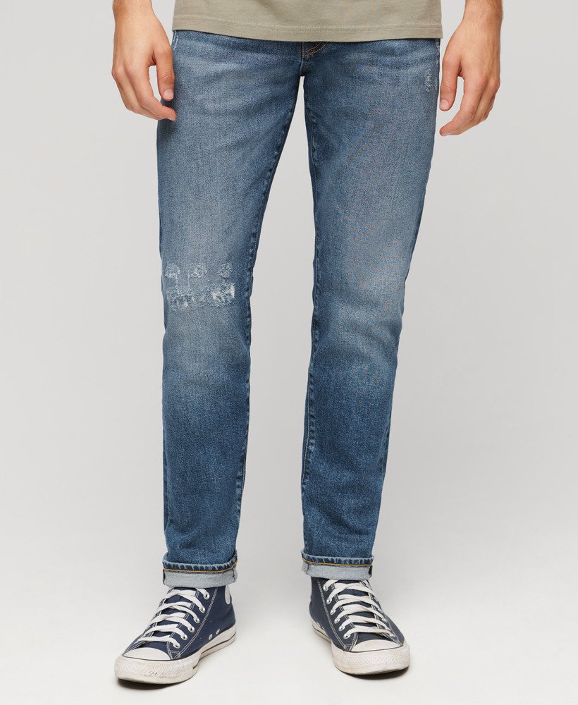 calça jeans vintage slim na cor azul folsom médio