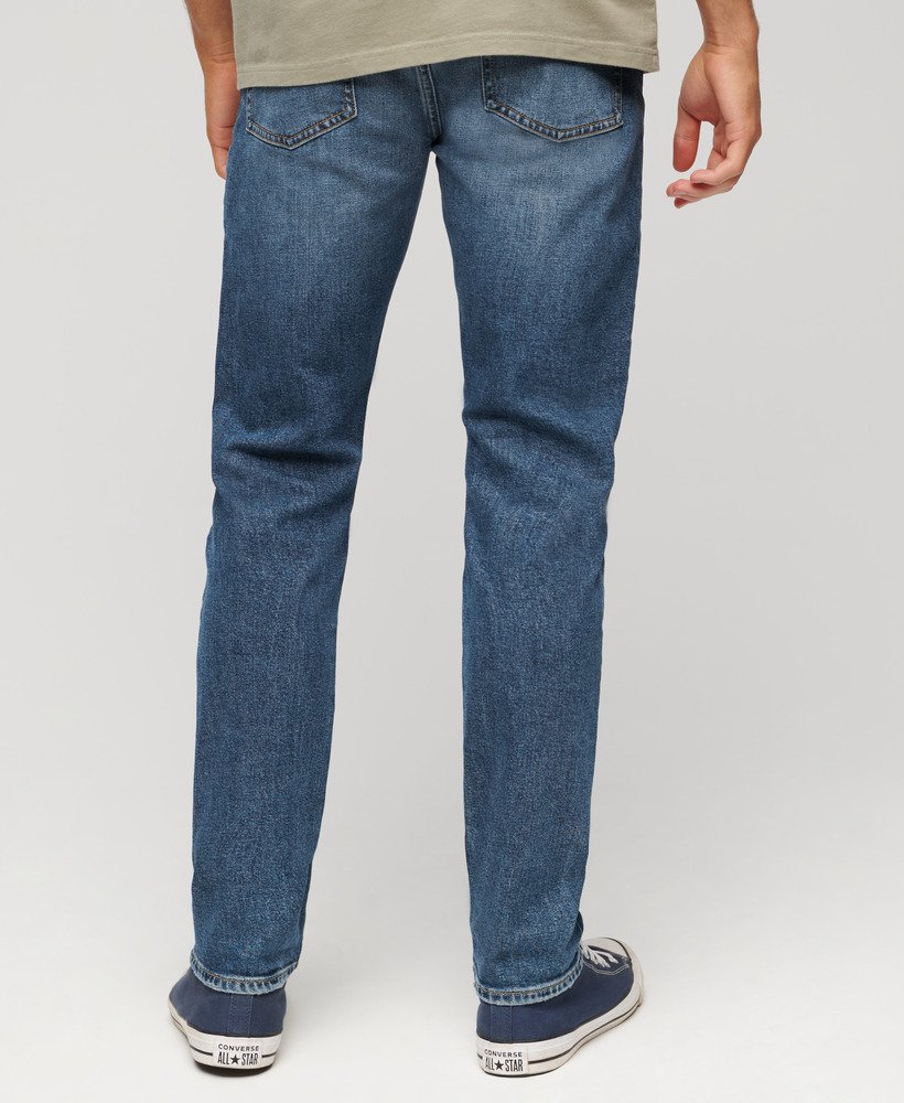 calça jeans vintage slim na cor azul folsom médio