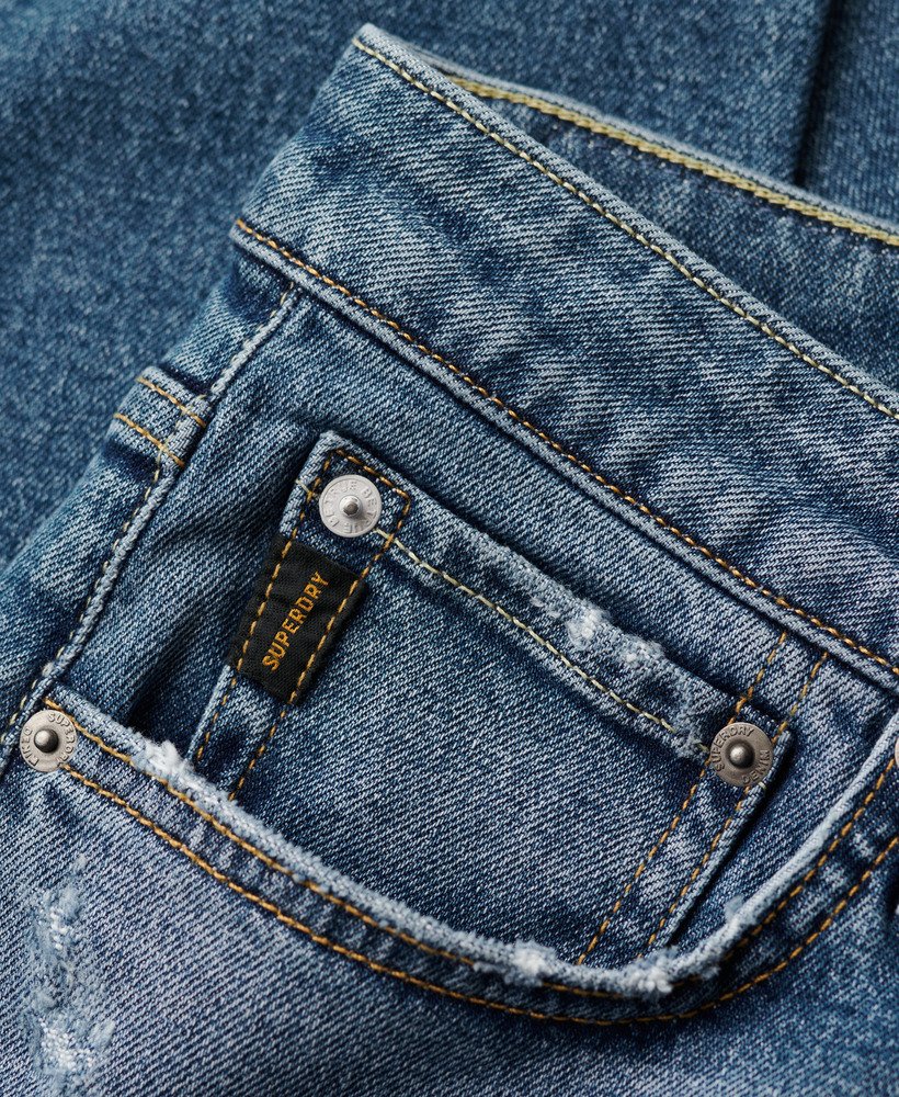 calça jeans vintage slim na cor azul folsom médio