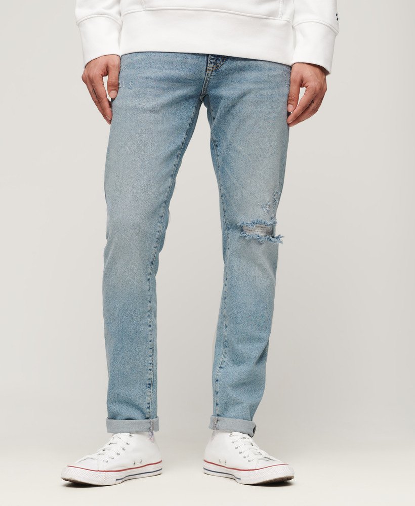 calça jeans vintage slim na cor azul shotwell