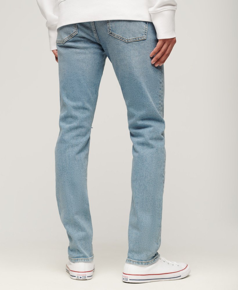 calça jeans vintage slim na cor azul shotwell