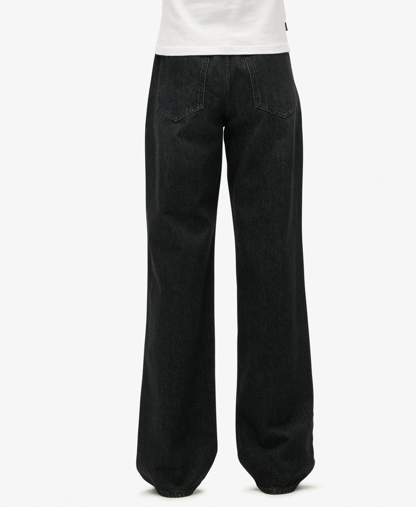 calça jeans de algodão orgânico de perna larga na cor wolcott black stone