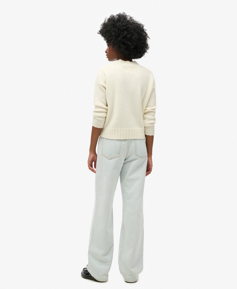 calça jeans de algodão orgânico de perna larga em tom índigo claro vintage.