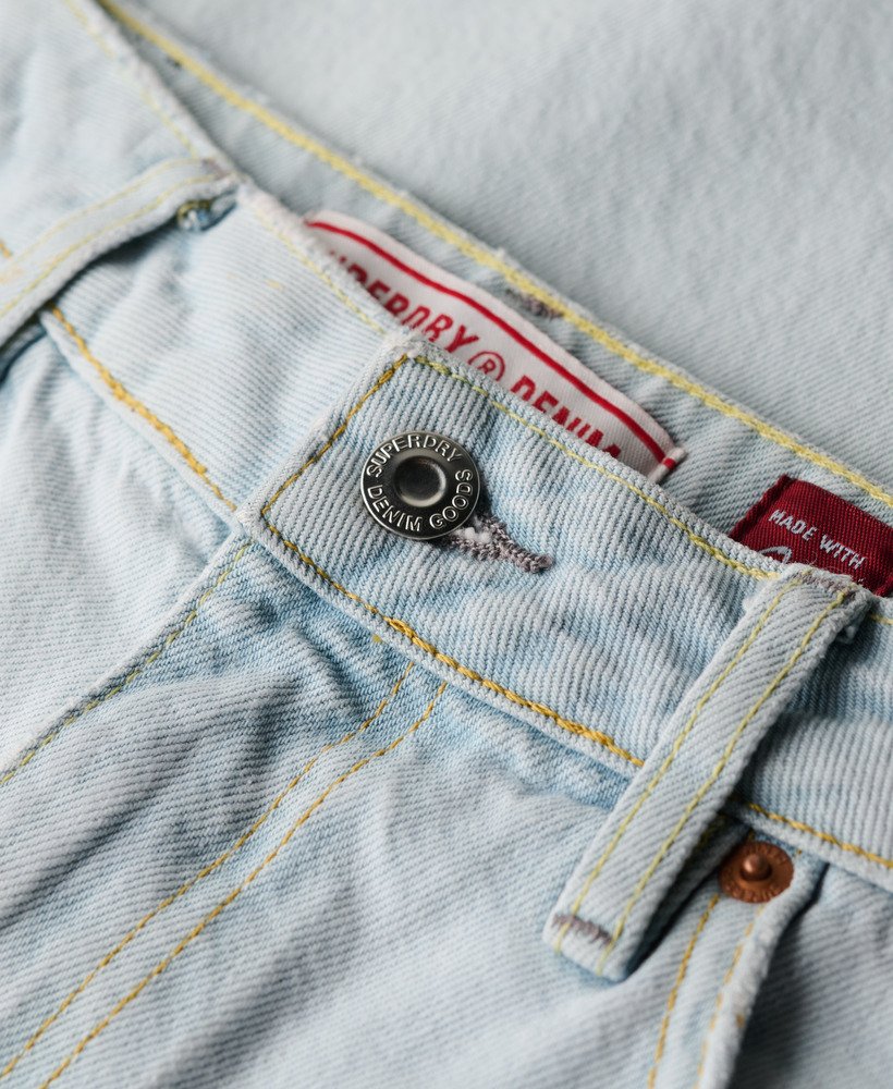 calça jeans de algodão orgânico de perna larga em tom índigo claro vintage.