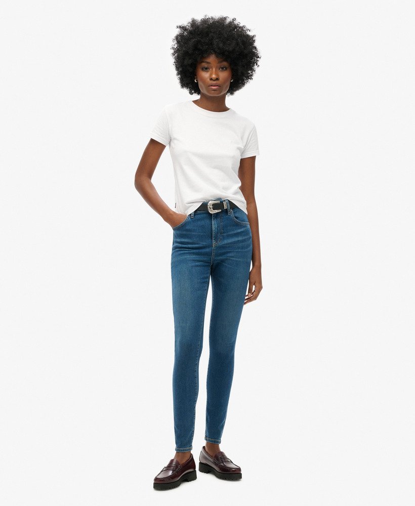 calça jeans skinny de cintura alta em algodão orgânico na cor azul vintage fulton.