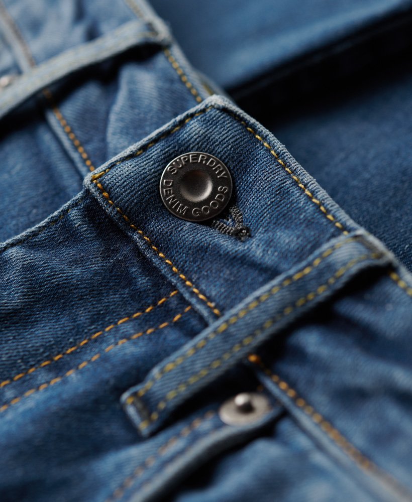 calça jeans skinny de cintura alta em algodão orgânico na cor azul vintage fulton.