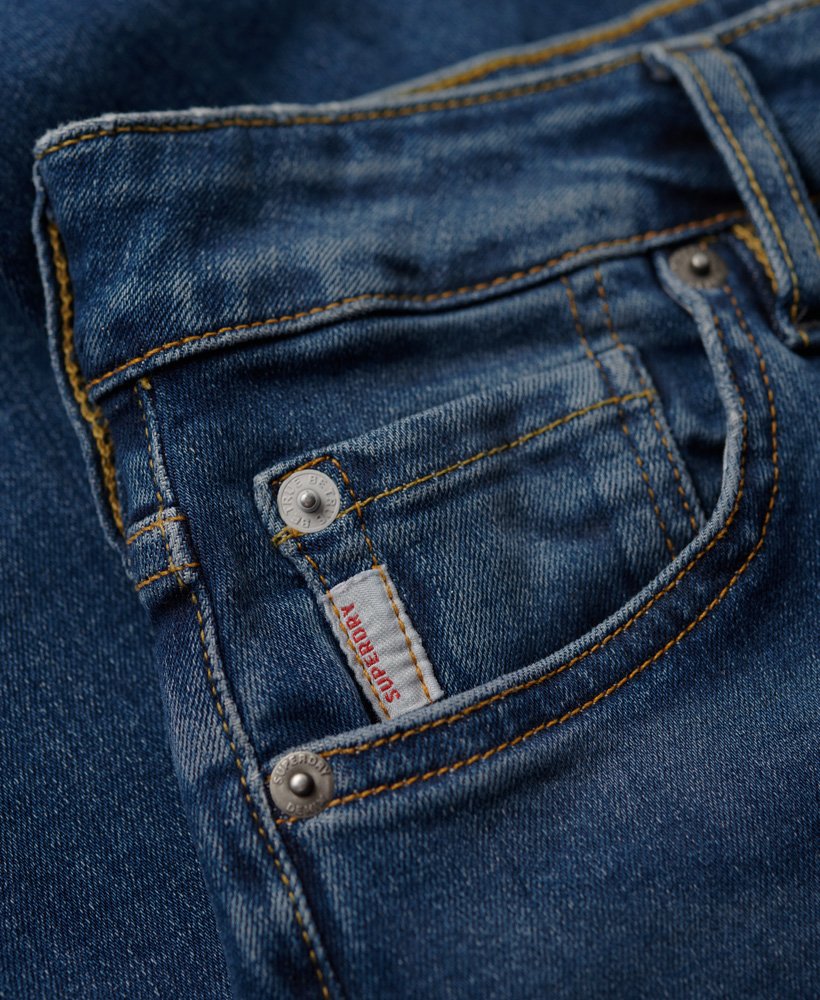 calça jeans skinny de cintura alta em algodão orgânico na cor azul médio salem.