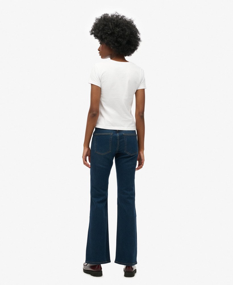 calça jeans vintage de cintura média corte flare slim modelo van dyke mid usada.