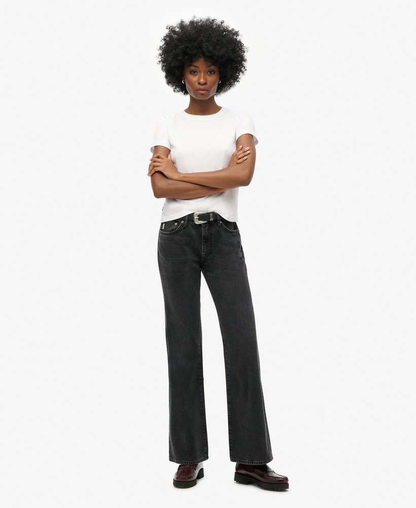 calça jeans vintage de cintura média e modelagem flare slim na cor walcott black stone.