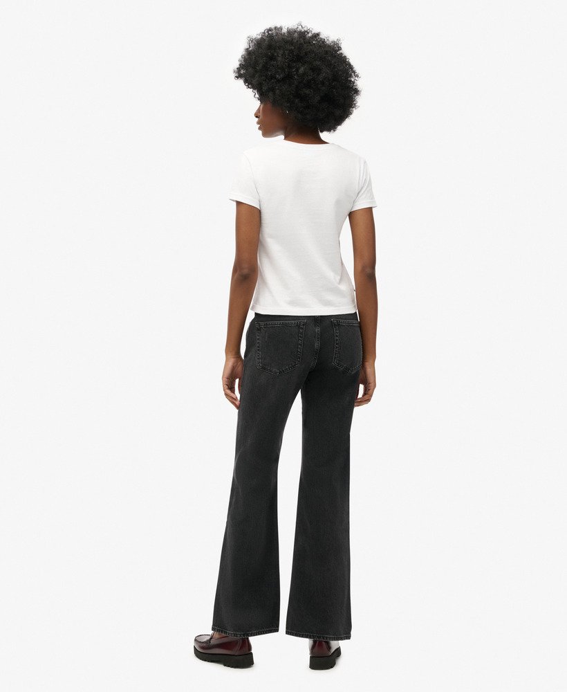 calça jeans vintage de cintura média e modelagem flare slim na cor walcott black stone.