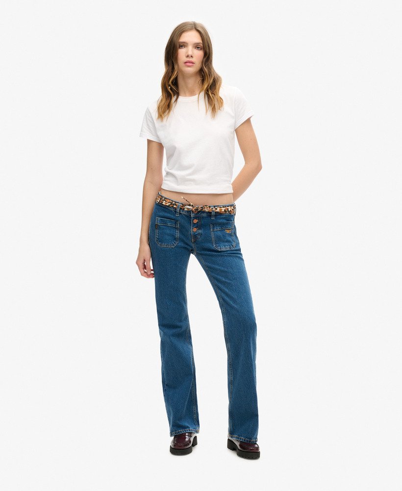 calça jeans vintage de algodão orgânico cintura baixa modelagem flare slim estilo van dyke mid. usada.