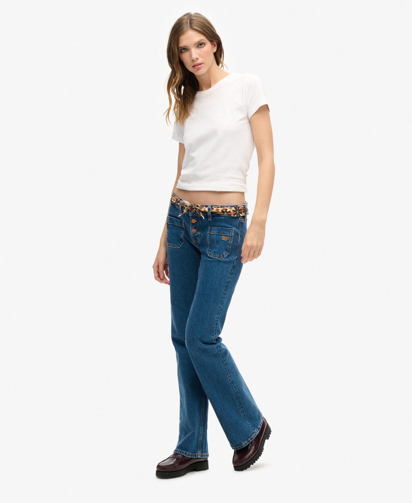 calça jeans vintage de algodão orgânico cintura baixa modelagem flare slim estilo van dyke mid. usada.