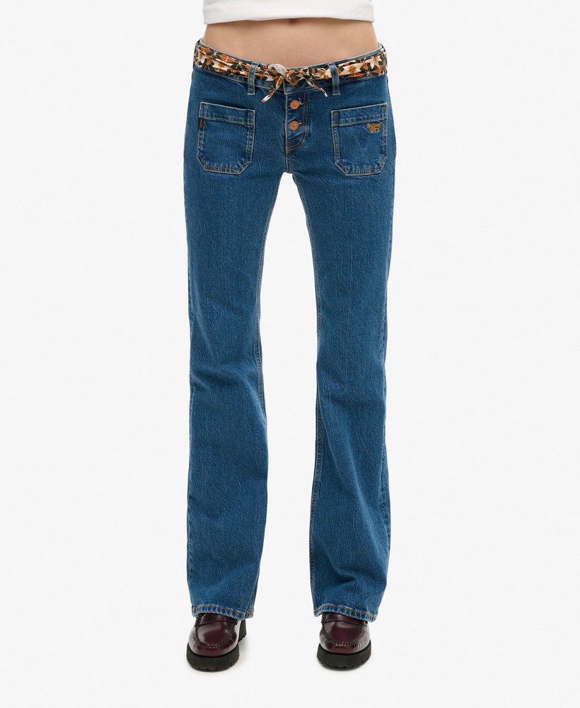 calça jeans vintage de algodão orgânico cintura baixa modelagem flare slim estilo van dyke mid. usada.