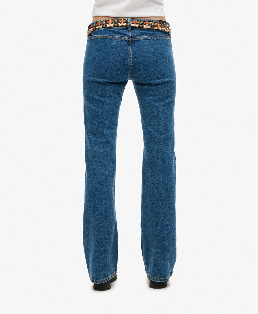 calça jeans vintage de algodão orgânico cintura baixa modelagem flare slim estilo van dyke mid. usada.