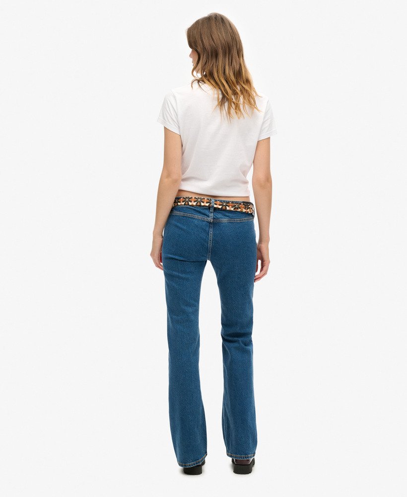 calça jeans vintage de algodão orgânico cintura baixa modelagem flare slim estilo van dyke mid. usada.