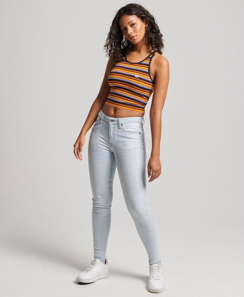 Calça jeans skinny vintage de algodão orgânico com cintura média