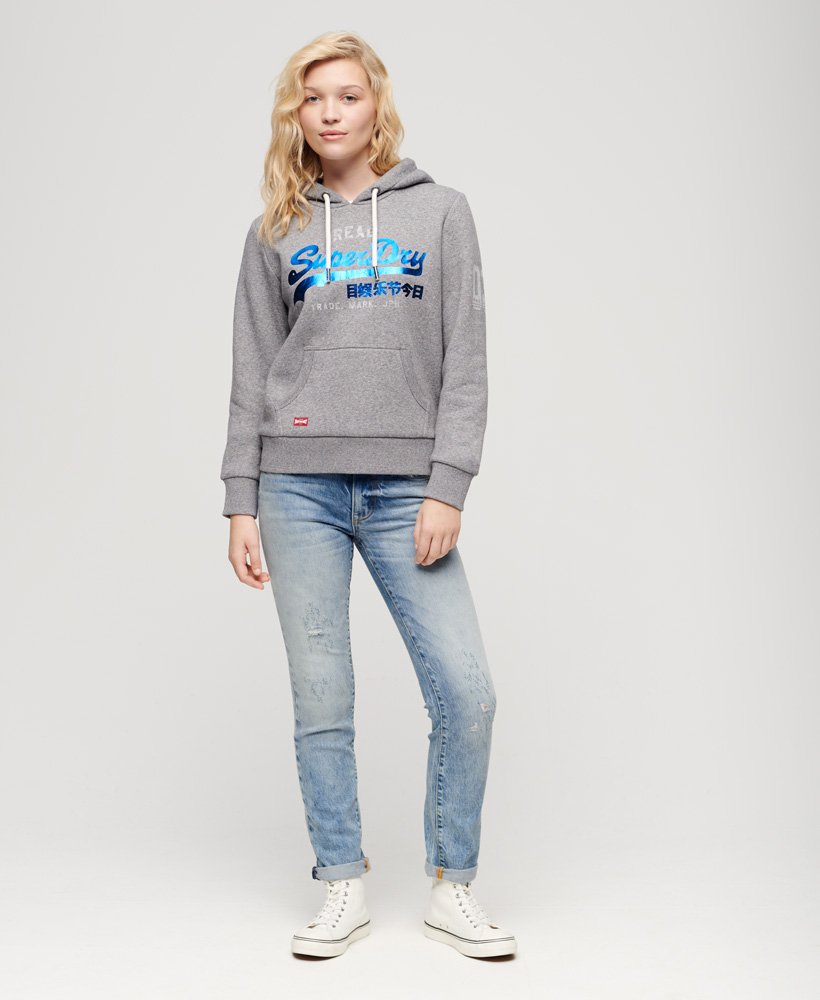calça jeans slim de cintura média em algodão orgânico na cor azul cânion.