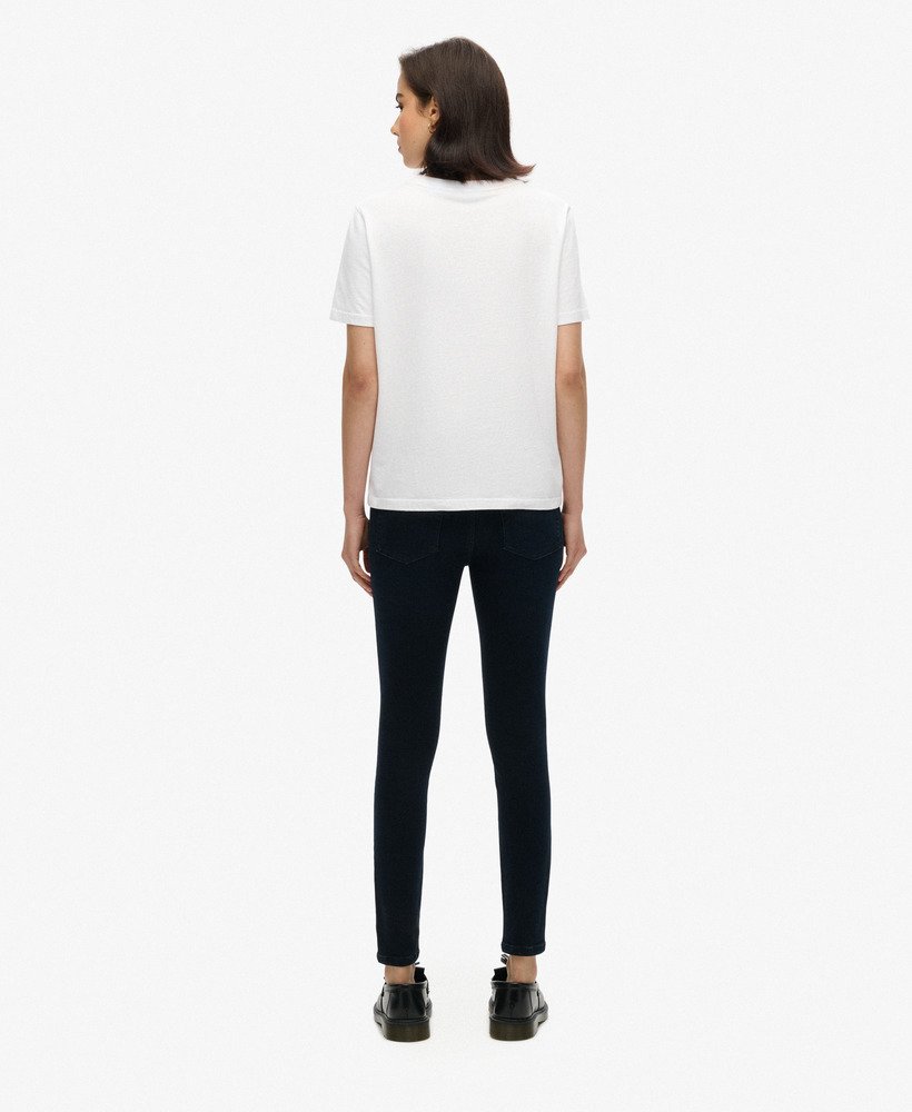 calça jeans skinny vintage de algodão orgânico cintura média nas cores azul víbora e preta.