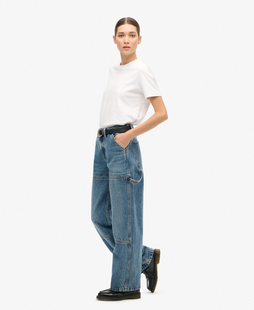calça jeans de cintura média estilo carpinteiro na cor azul guerrero mid blue