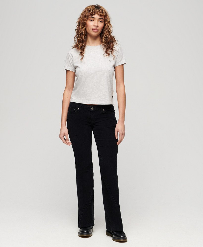 calça jeans flare de veludo cotelê de cintura baixa na cor preta.
