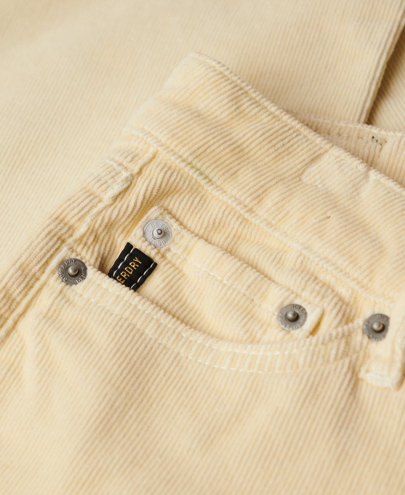 calça jeans flare de veludo cotelê de cintura baixa na cor ostra