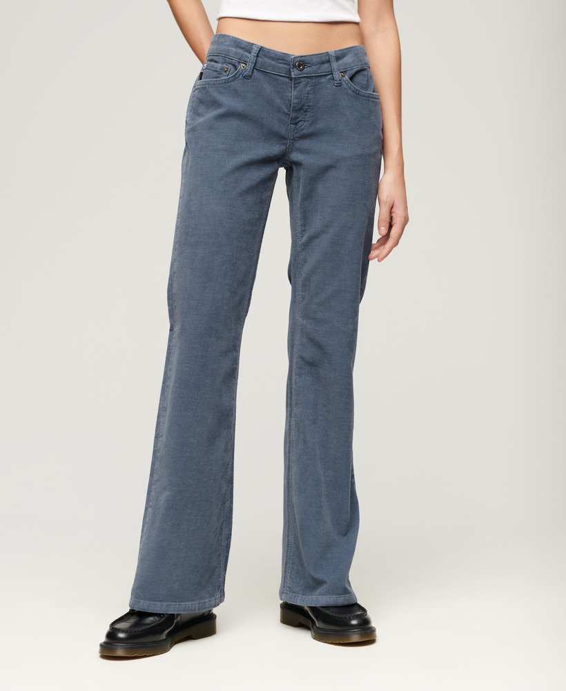 calça jeans flare de cintura baixa em veludo cotelê azul lavado