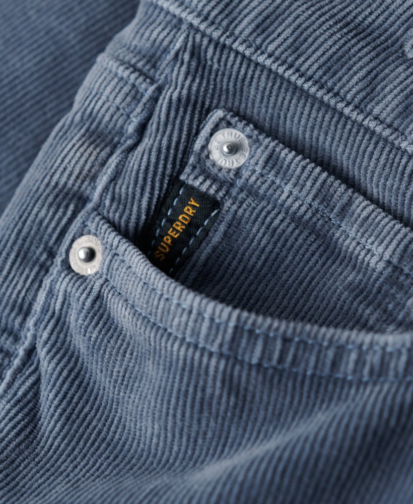 calça jeans flare de cintura baixa em veludo cotelê azul lavado