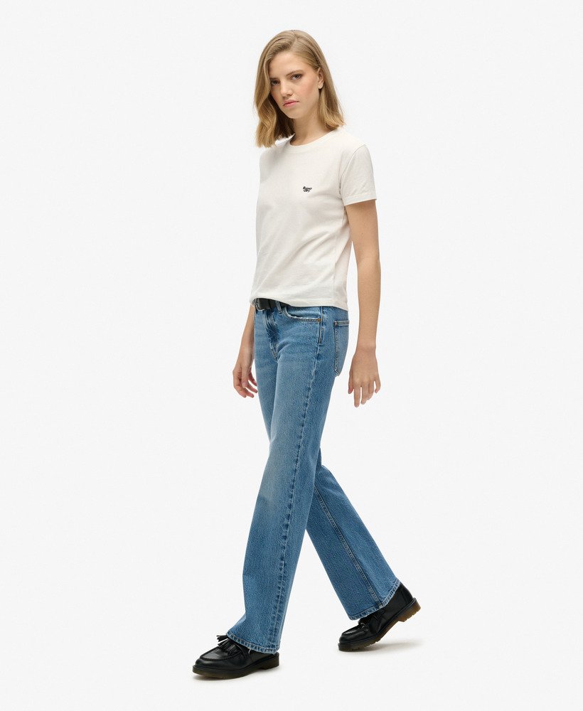 calça jeans vintage de cintura média modelagem flare slim na cor azul lavado beecher.