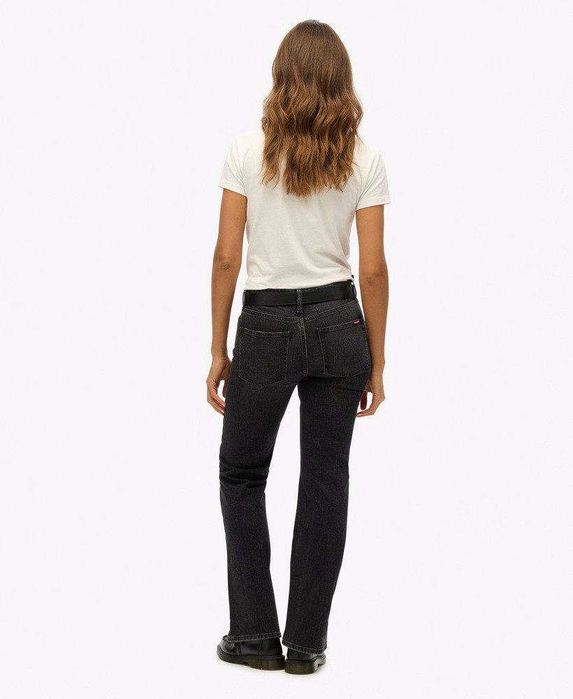 Calça jeans vintage de cintura média e modelagem flare slim.